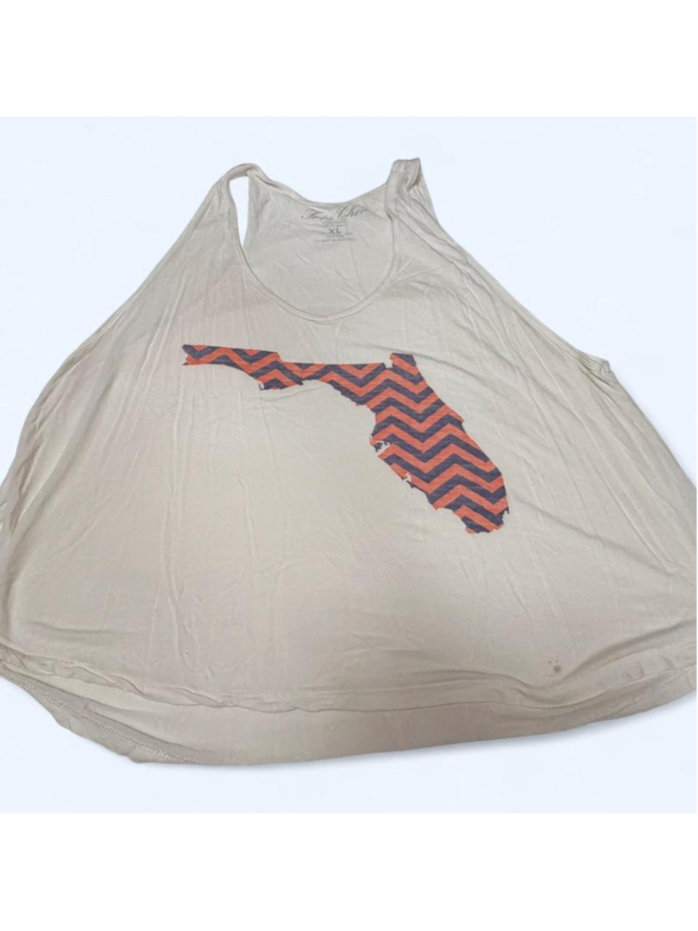 Tres Chic white rayon shirt with orange and dark blue chevron pattern in the sha